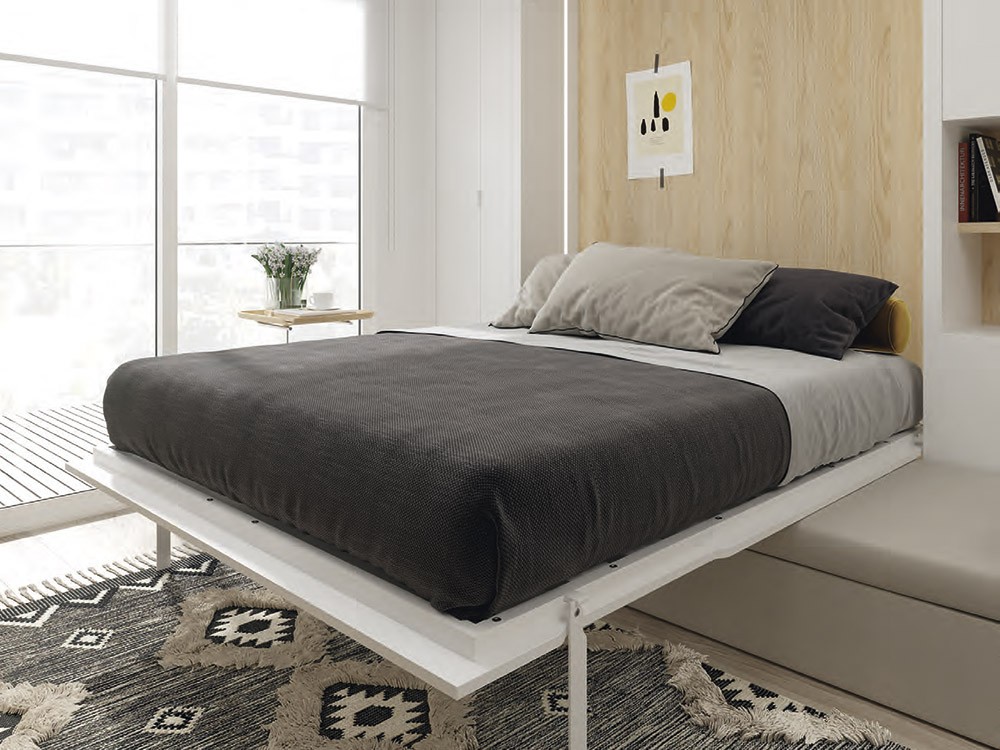 Sofá integrado en cama abatible con nido de arrastre y escritorio.