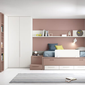 dormitorio infantil con cama compacto y armario combinada en blanco y rosa pale