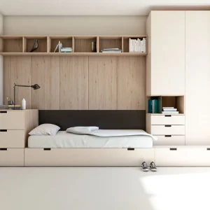 dormitorio juvenil con modulacion apilada de cama nido con dos camas,modulos de cjaones apilados,estanteria a pared y armarios con cajones y huecos